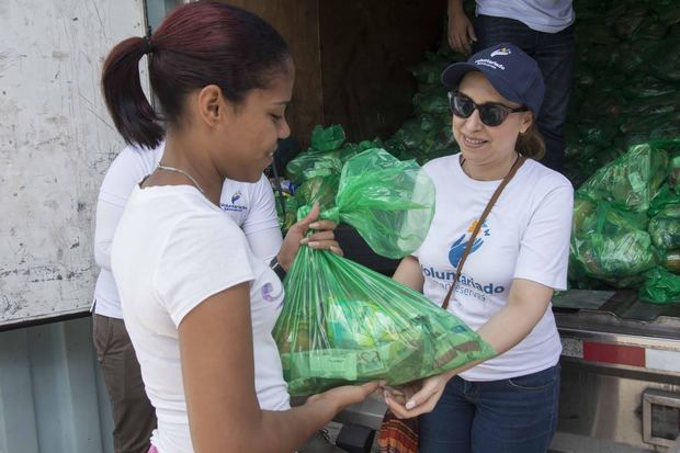 Voluntariado Banreservas beneficia más de 132 mil familias
que colaboran en saneamiento del Ozama y Yaque del Norte.