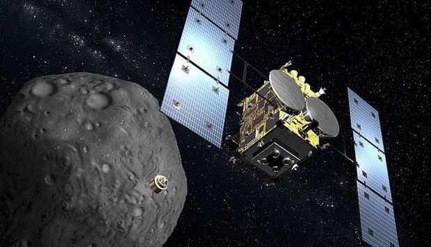 Recreación digital de la sonda japonesa Hayabusa2 y el asteroide Ryugu cedida por la Agencia Aeroespacial de Japón (JAXA). La sonda nipona emprendió este miércoles su viaje de regreso a la Tierra tras conseguir muestras del remoto asteroide, lo que supone un logro sin precedentes en la exploración del universo.