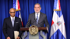 El consultor jurídico del Poder Ejecutivo, Flavio Darío Espinal y Roberto Rodriguez Marchena , portavoz del Gobierno.