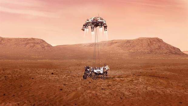 Fotografía cedida este miércoles por la Administración Nacional de Aeronáutica y el Espacio (NASA) que muestra una ilustración del rover Perseverance mientras aterriza de forma segura sobre la superficie de Marte.
